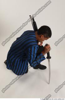 09 GARSON KNEELING POSE WITH KATANA AND SHOTGUN